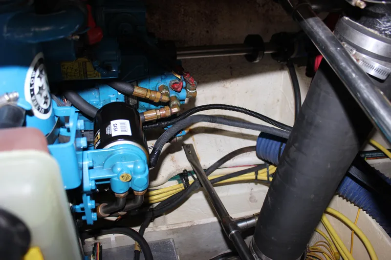  Yacht Photos Pics Engine compartment of a 2007 Silverton 36 Convertible boat, showing mechanical components and wiring.