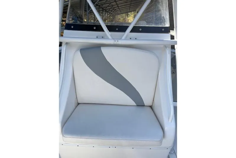 Sashimi Yacht Photos Pics 2006 Fountain 38 Tournament Edition boat seat with white and gray upholstery.