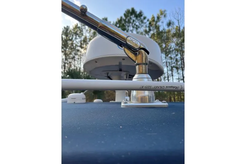 Sashimi Yacht Photos Pics Close-up of 2006 Fountain 38 Tournament Edition boat equipment with trees in the background.