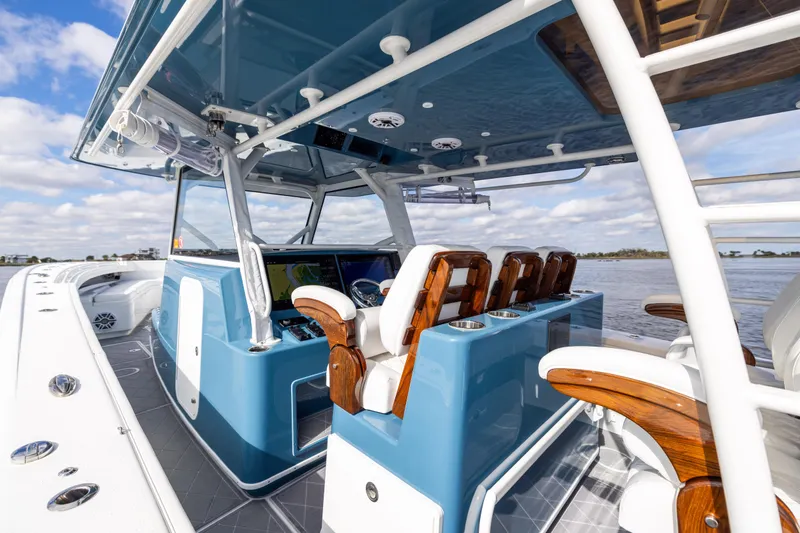 Fishistics Yacht Photos Pics 2024 Yellowfin 42 Offshore boat interior with sleek design and advanced navigation system.