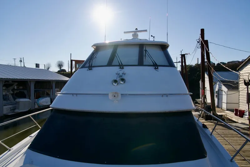  Yacht Photos Pics Front view of a 2000 Carver 506 Motor Yacht docked under a clear sky.