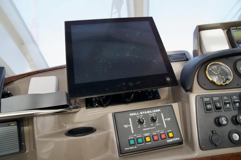  Yacht Photos Pics Control panel of a 2000 Carver 506 Motor Yacht with navigation and stabilizer systems.