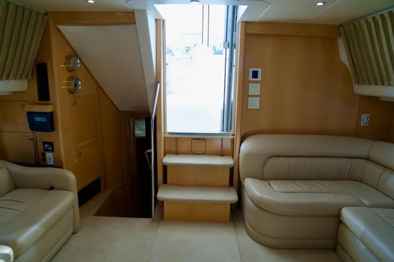  Yacht Photos Pics Interior of 2000 Carver 506 Motor Yacht with beige leather seating and wooden accents.