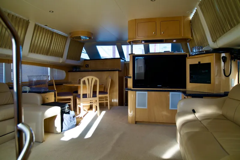  Yacht Photos Pics Luxurious interior of 2000 Carver 506 Motor Yacht with modern furnishings and entertainment system.