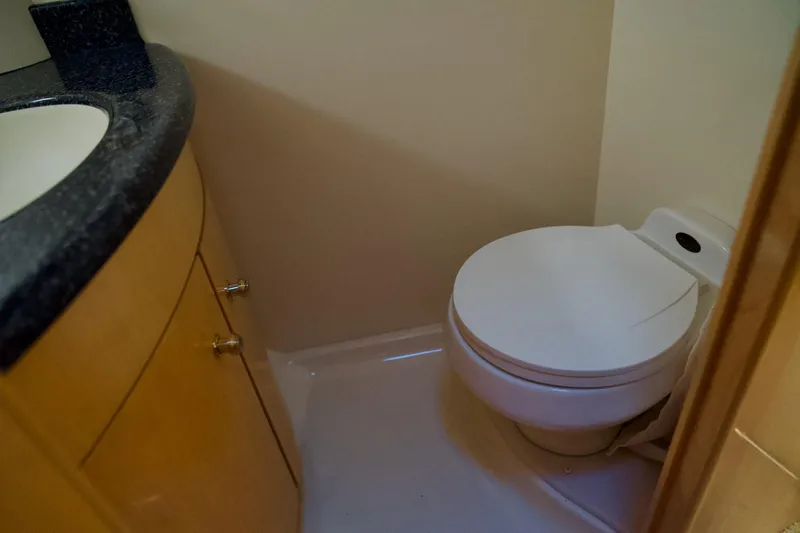  Yacht Photos Pics Bathroom interior of 2000 Carver 506 Motor Yacht with toilet and sink.