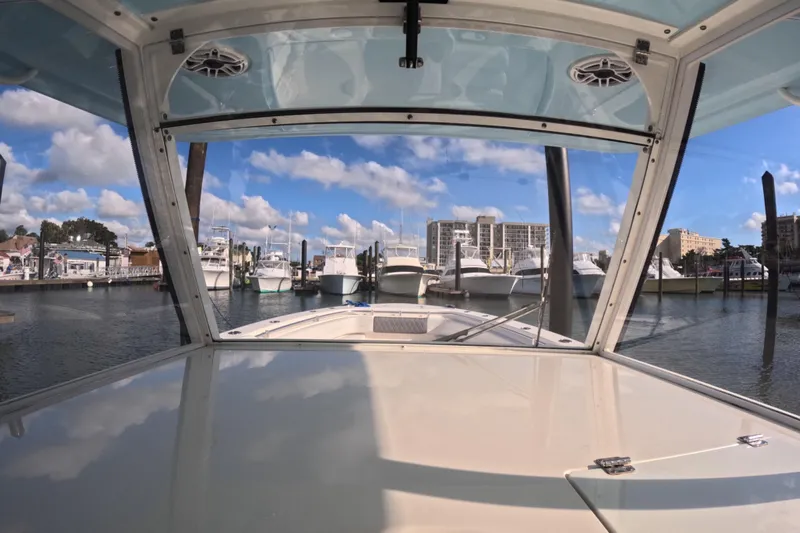 Yacht Photos Pics 2020 Cobia 350 Center Console boat docked in a marina under a clear blue sky.