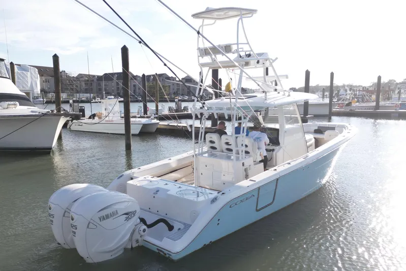  Yacht Photos Pics 2020 Cobia 350 Center Console boat docked with twin Yamaha engines.