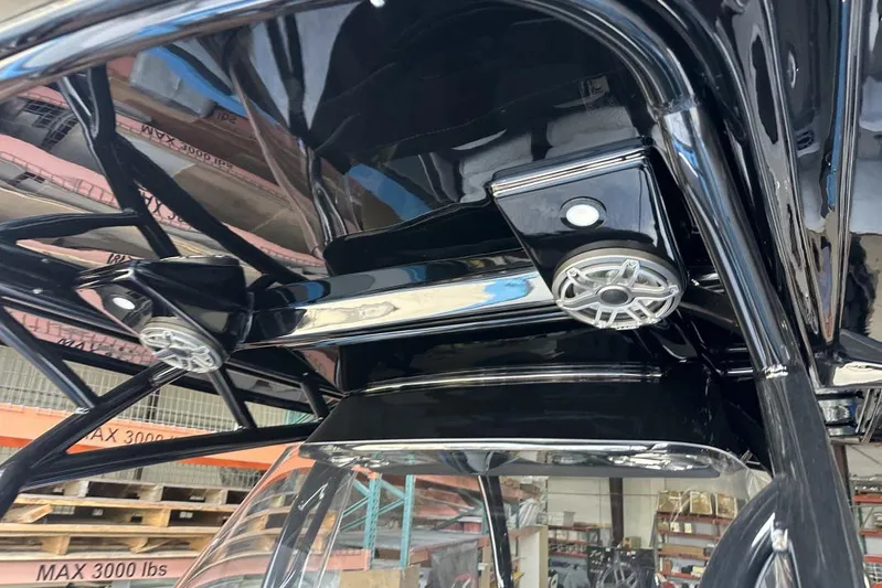  Yacht Photos Pics 2025 Nor-Tech 340 Sport Center Console with sleek black framework and integrated speakers.