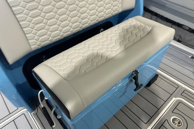 Yacht Photos Pics 2025 Nor-Tech 340 Sport Center Console seat with hexagonal pattern upholstery and blue base.