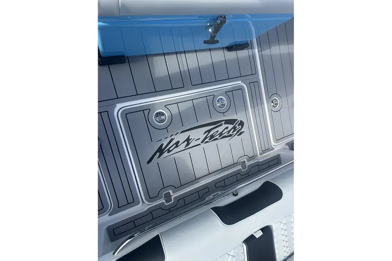  Yacht Photos Pics 2025 Nor-Tech 340 Sport Center Console boat deck with logo and sleek design.