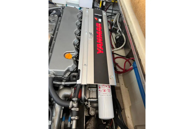 Gullywhumper Yacht Photos Pics Engine compartment of 2001 Ellis 36 Flybridge with Yanmar engine visible.