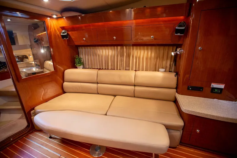  Yacht Photos Pics Luxurious interior of 2008 Regal 38 yacht with beige leather seating and wooden accents.
