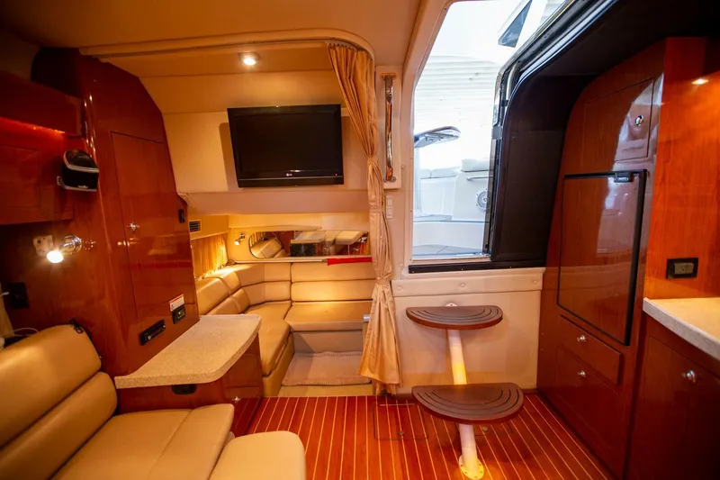  Yacht Photos Pics Luxurious interior of 2008 Regal 38 yacht with cozy seating and modern amenities.