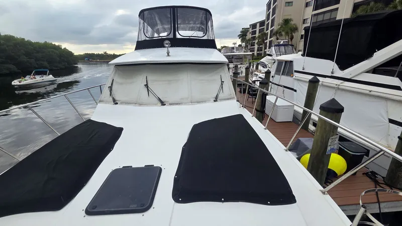 Toes In The Water Yacht Photos Pics 1998 Navigator 5300 yacht docked at marina.