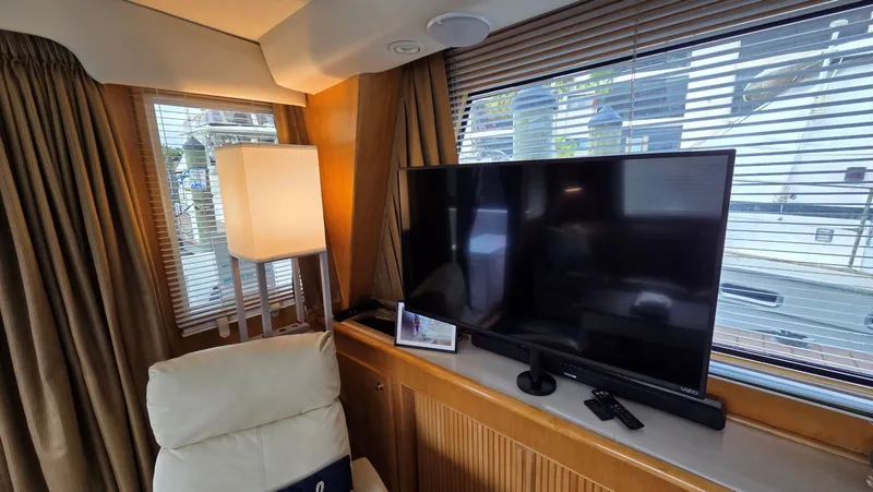 Toes In The Water Yacht Photos Pics Interior of a Navigator 5300 yacht with TV and lamp.