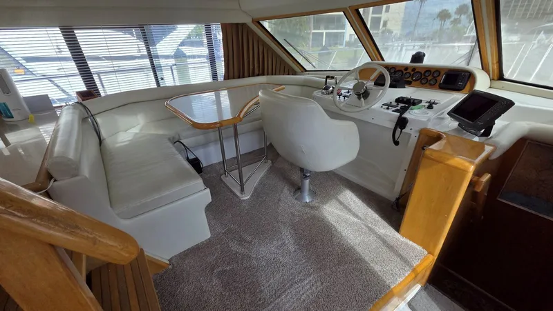 Toes In The Water Yacht Photos Pics Interior of a 1998 Navigator 5300 yacht with helm station.