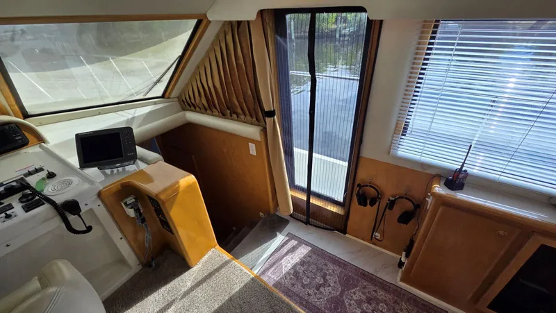 Toes In The Water Yacht Photos Pics Interior of a 1998 Navigator 5300 yacht with helm area.