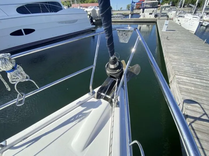  Yacht Photos Pics Bow of 2006 Hunter 45 Center Cockpit sailboat docked at marina.