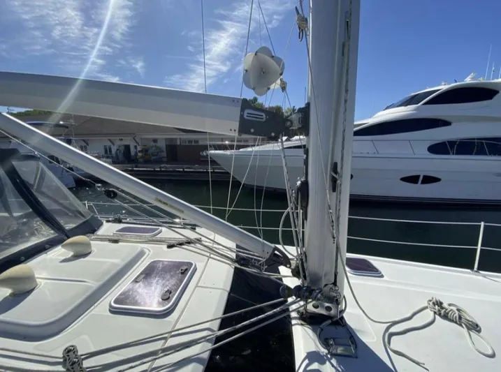  Yacht Photos Pics 2006 Hunter 45 Center Cockpit sailboat docked, featuring rigging and deck details.