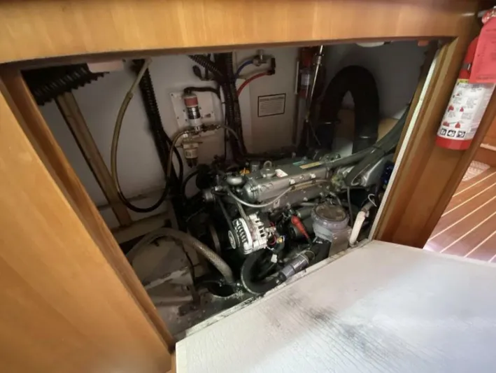  Yacht Photos Pics Engine compartment of 2006 Hunter 45 Center Cockpit sailboat, featuring visible mechanical components.