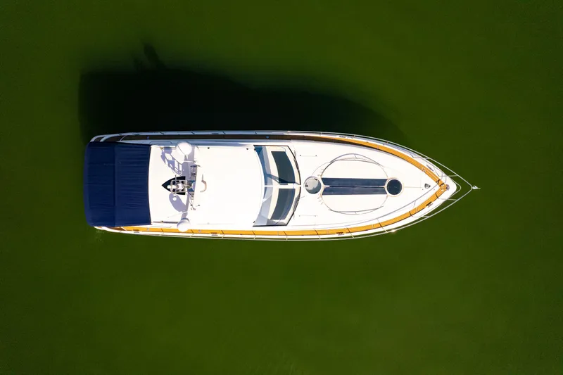 Just-us Yacht Photos Pics Overhead view of 2009 Fairline Targa 52 yacht on green water.