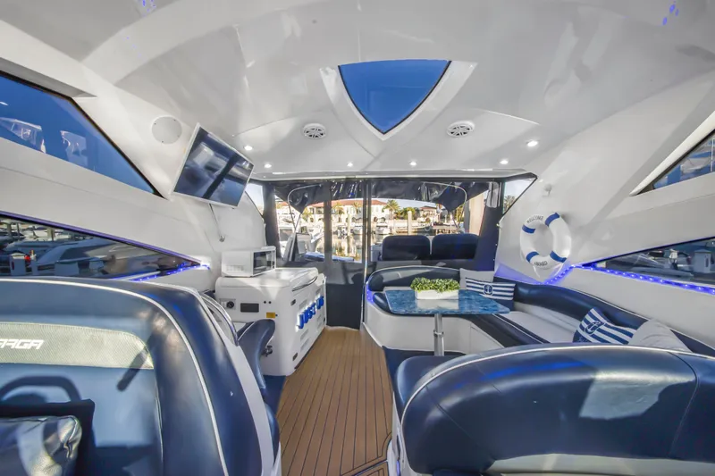 Just-us Yacht Photos Pics Luxurious interior of 2009 Fairline Targa 52 yacht with modern seating and decor.