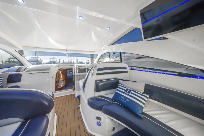 Just-us Yacht Photos Pics Luxurious interior of 2009 Fairline Targa 52 yacht with elegant seating and modern design.