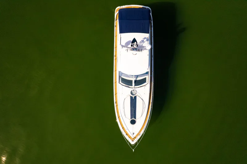 Just-us Yacht Photos Pics Aerial view of 2009 Fairline Targa 52 yacht on green water.