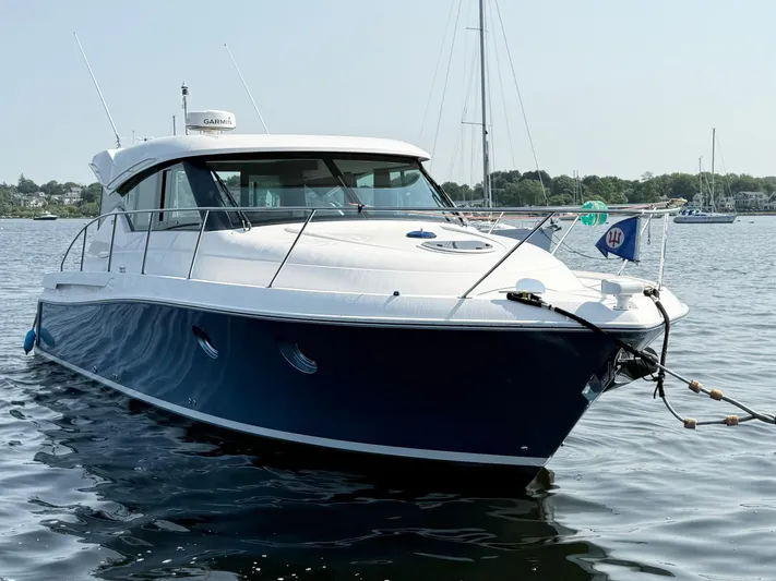 Silver Lining, Name Reserved Yacht Photos Pics 2017 Tiara Yachts 39 Coupe on calm water, showcasing sleek design and luxury features.