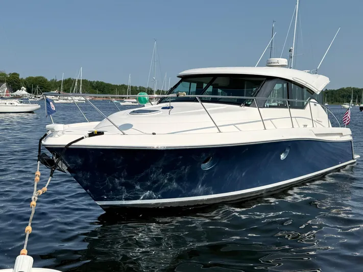 Silver Lining, Name Reserved Yacht Photos Pics 2017 Tiara Yachts 39 Coupe in water, sleek design, blue and white exterior.