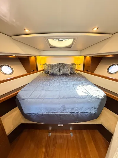 Silver Lining, Name Reserved Yacht Photos Pics Luxurious cabin interior of 2017 Tiara Yachts 39 Coupe with elegant bedding.