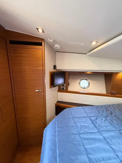 Silver Lining, Name Reserved Yacht Photos Pics 2017 Tiara Yachts 39 Coupe cabin with wood paneling and porthole.