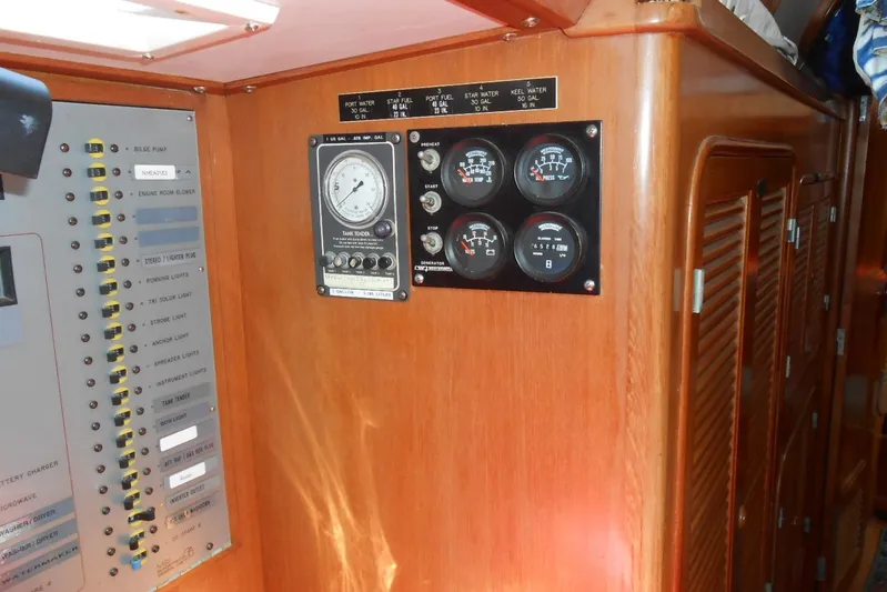 Second Kiss Yacht Photos Pics Control panel of a 1989 Norseman 447 yacht with gauges and switches.