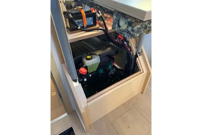  Yacht Photos Pics Engine compartment of 2023 Hanse 588 yacht, showcasing battery and wiring.