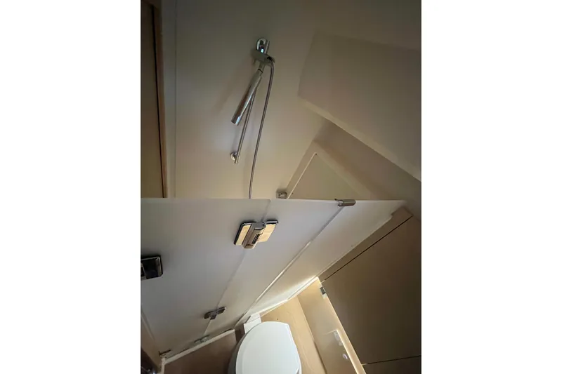  Yacht Photos Pics Interior of 2023 Hanse 588 yacht bathroom with shower and toilet.