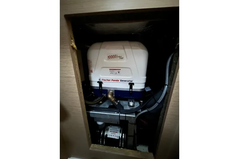  Yacht Photos Pics Fischer Panda generator inside 2023 Hanse 588 yacht, showcasing compact installation.