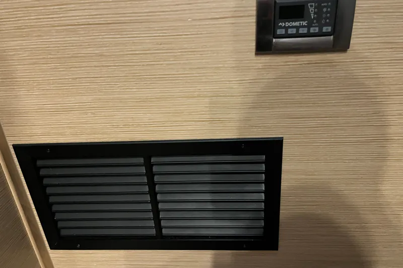  Yacht Photos Pics Vent and control panel on 2023 Hanse 588 yacht interior wall.
