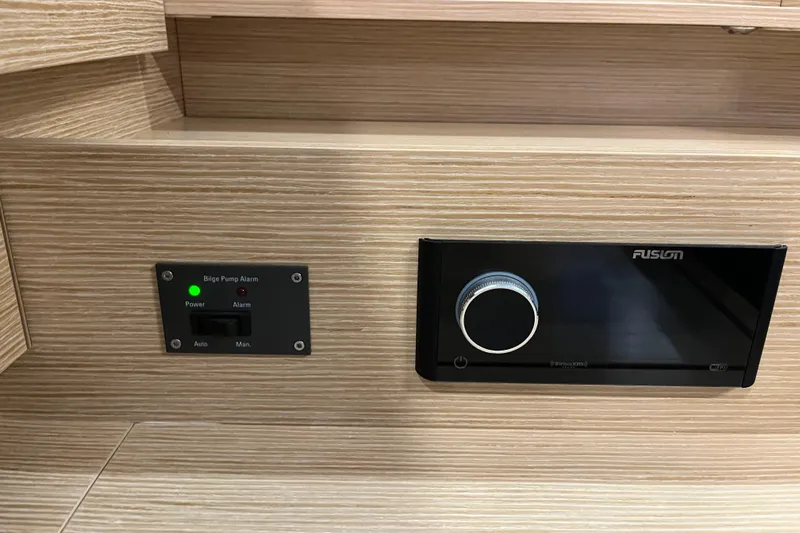  Yacht Photos Pics Control panel and Fusion stereo on 2023 Hanse 588 yacht interior.