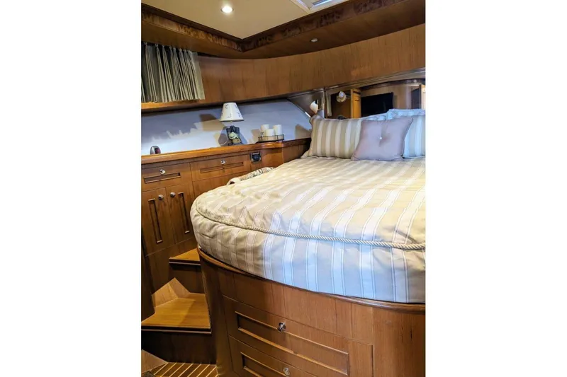 Prairie Sky Yacht Photos Pics Luxurious cabin interior of 2008 Ocean Alexander 48C Classicco yacht with cozy bedding.
