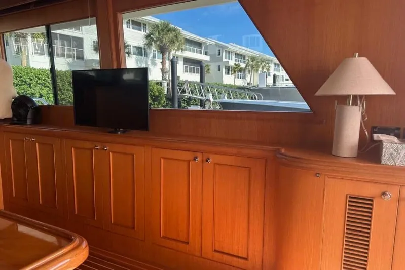 Prairie Sky Yacht Photos Pics Interior of 2008 Ocean Alexander 48C Classicco yacht with wood paneling and window view.