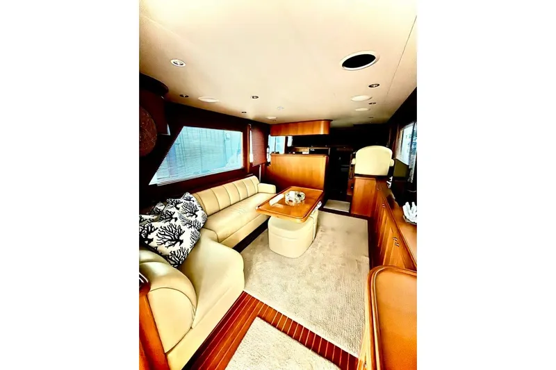 Prairie Sky Yacht Photos Pics Luxurious interior of 2008 Ocean Alexander 48C Classicco yacht with elegant seating and decor.