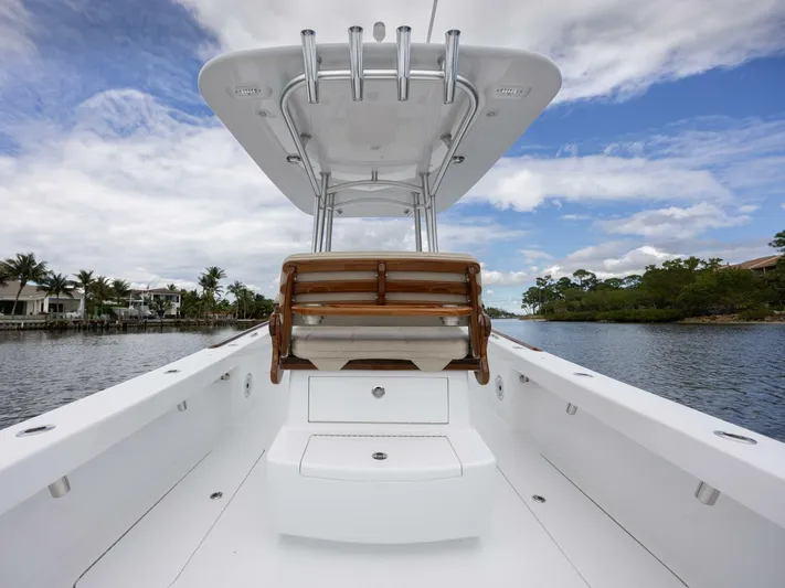  Yacht Photos Pics 2024 Xcelerator Boatworks 26, sleek design, spacious deck, scenic waterway backdrop.