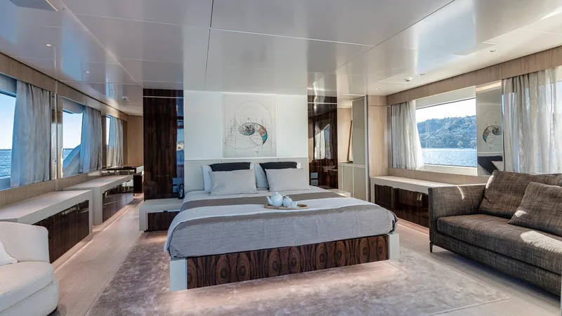 Oceanic 143 Yacht Photos Pics Luxurious bedroom interior on 2023 Canados 143 yacht with ocean view.