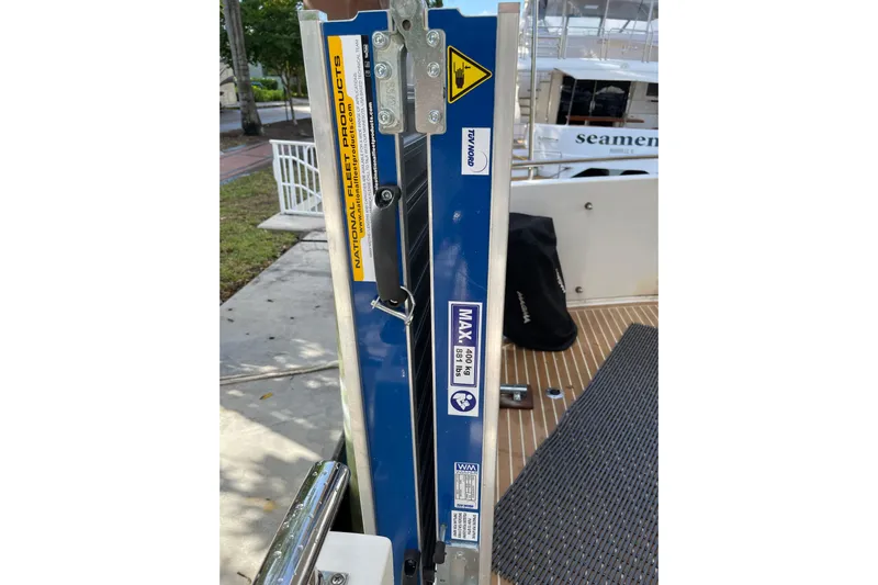 "fortunate" Yacht Photos Pics Close-up of a Johnson 65 Flybridge Motoryacht's lift mechanism, 1995 model.