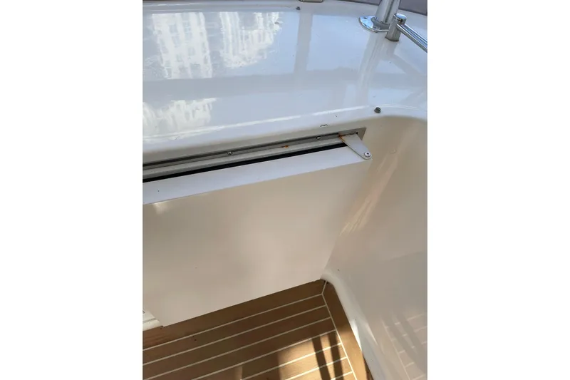 "fortunate" Yacht Photos Pics White interior detail of 1995 JOHNSON 65 Flybridge Motoryacht with wooden flooring.