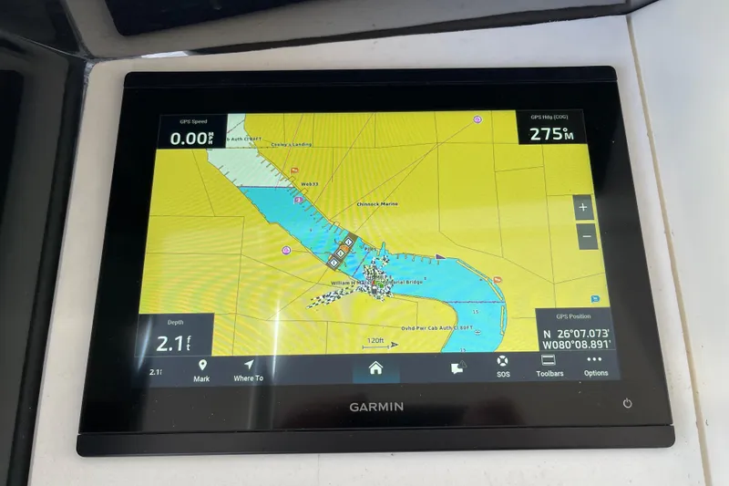 "fortunate" Yacht Photos Pics Garmin navigation display on 1995 JOHNSON 65 Flybridge Motoryacht showing map and coordinates.