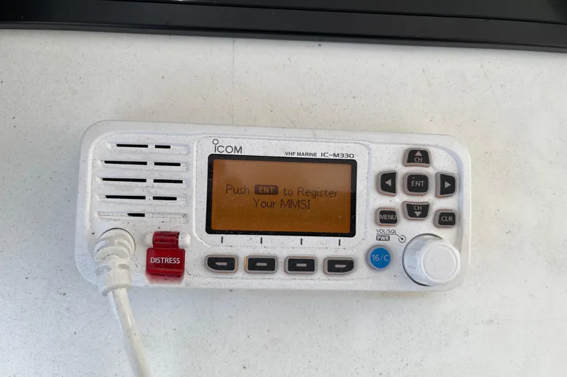"fortunate" Yacht Photos Pics ICOM VHF Marine IC-M330 radio on 1995 JOHNSON 65 Flybridge Motoryacht dashboard.