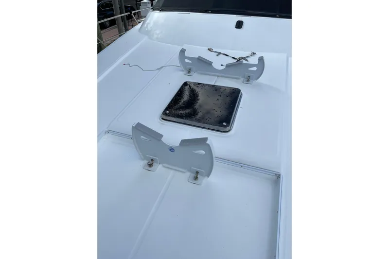 "fortunate" Yacht Photos Pics Deck of 1995 JOHNSON 65 Flybridge Motoryacht with hatch and fittings.