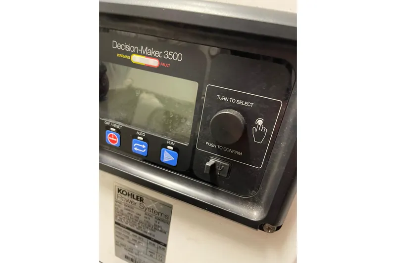 "fortunate" Yacht Photos Pics Control panel of a 1995 JOHNSON 65 Flybridge Motoryacht with Kohler Power Systems.