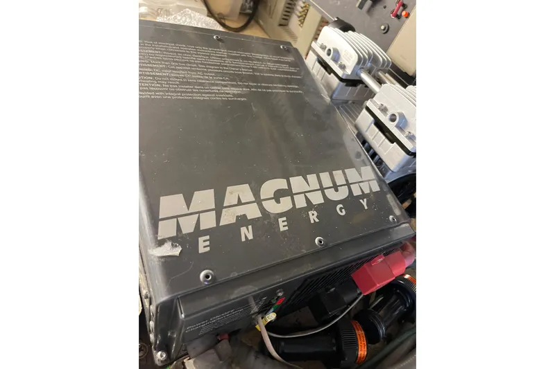 "fortunate" Yacht Photos Pics Magnum Energy component in 1995 JOHNSON 65 Flybridge Motoryacht engine room.